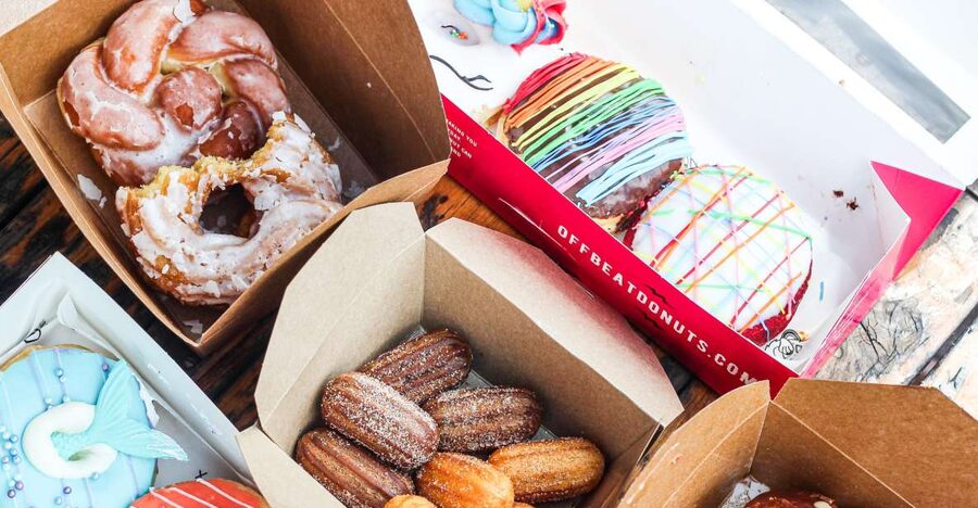 Cork Delicious Donut Adventure by Underground Donut Tour - Walking Oliver Plunkett Street between bites