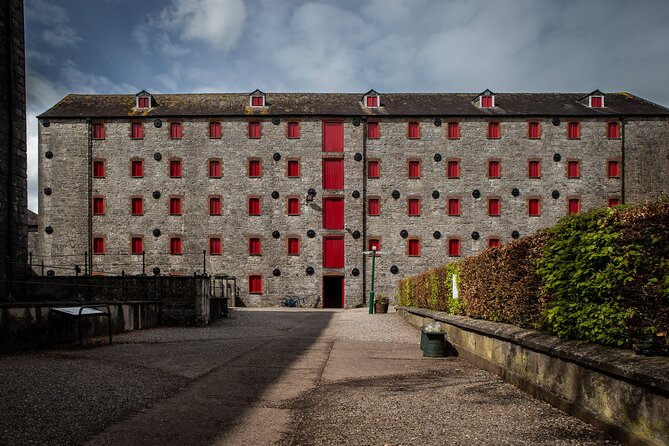 Cork Midleton DistilleryJameson Experience & Whiskey Tasting - Walking past kilns, mills, and old distilling equipment