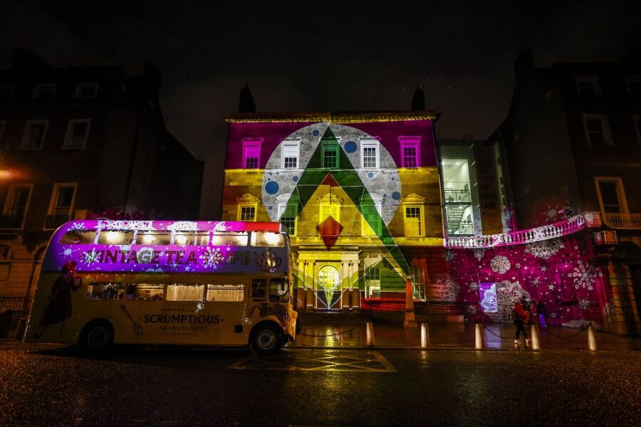 Dublin: Christmas Lights Festive Bus Tour with Afternoon Tea - Seeing City Hall and Trinity College after dark