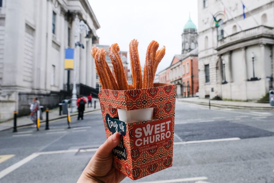 Dublin: Guided Delicious Donut Tour with Tastings - Crossing the River Liffey to Offbeat Donuts